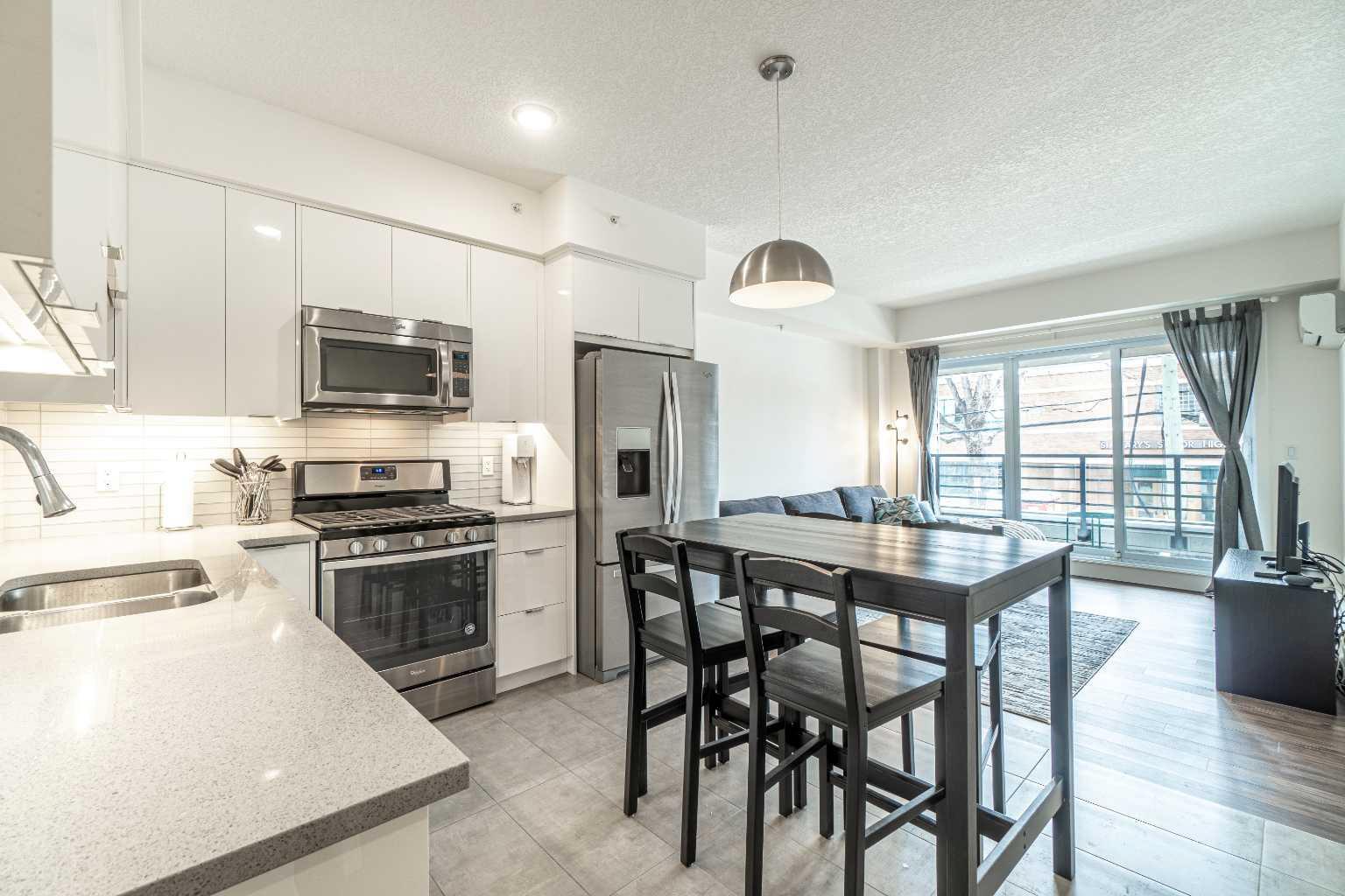 Property Photo: 128 18 Avenue SW - AB T2S 0B9