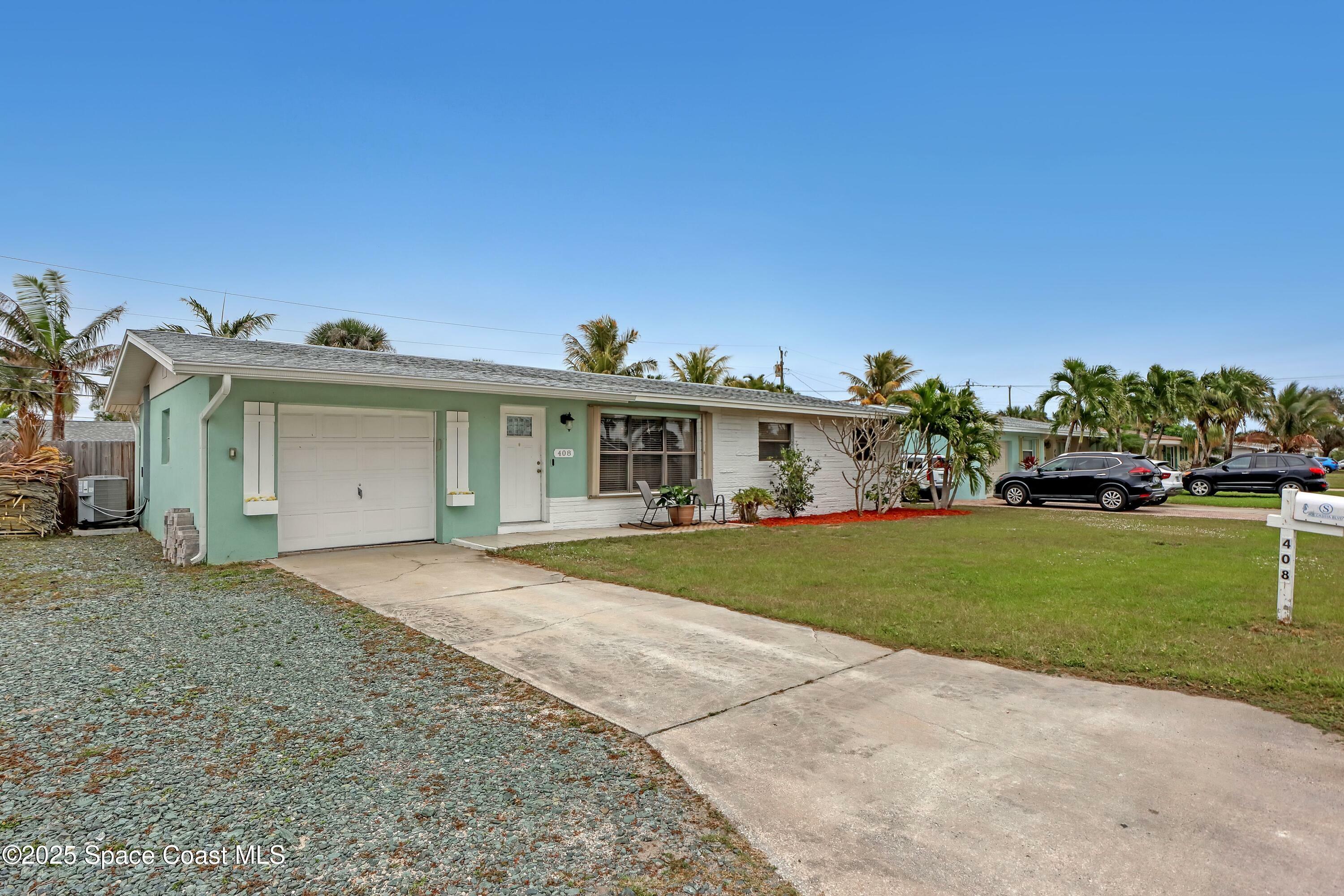 Property Photo:  408 Cassia Boulevard  FL 32937 