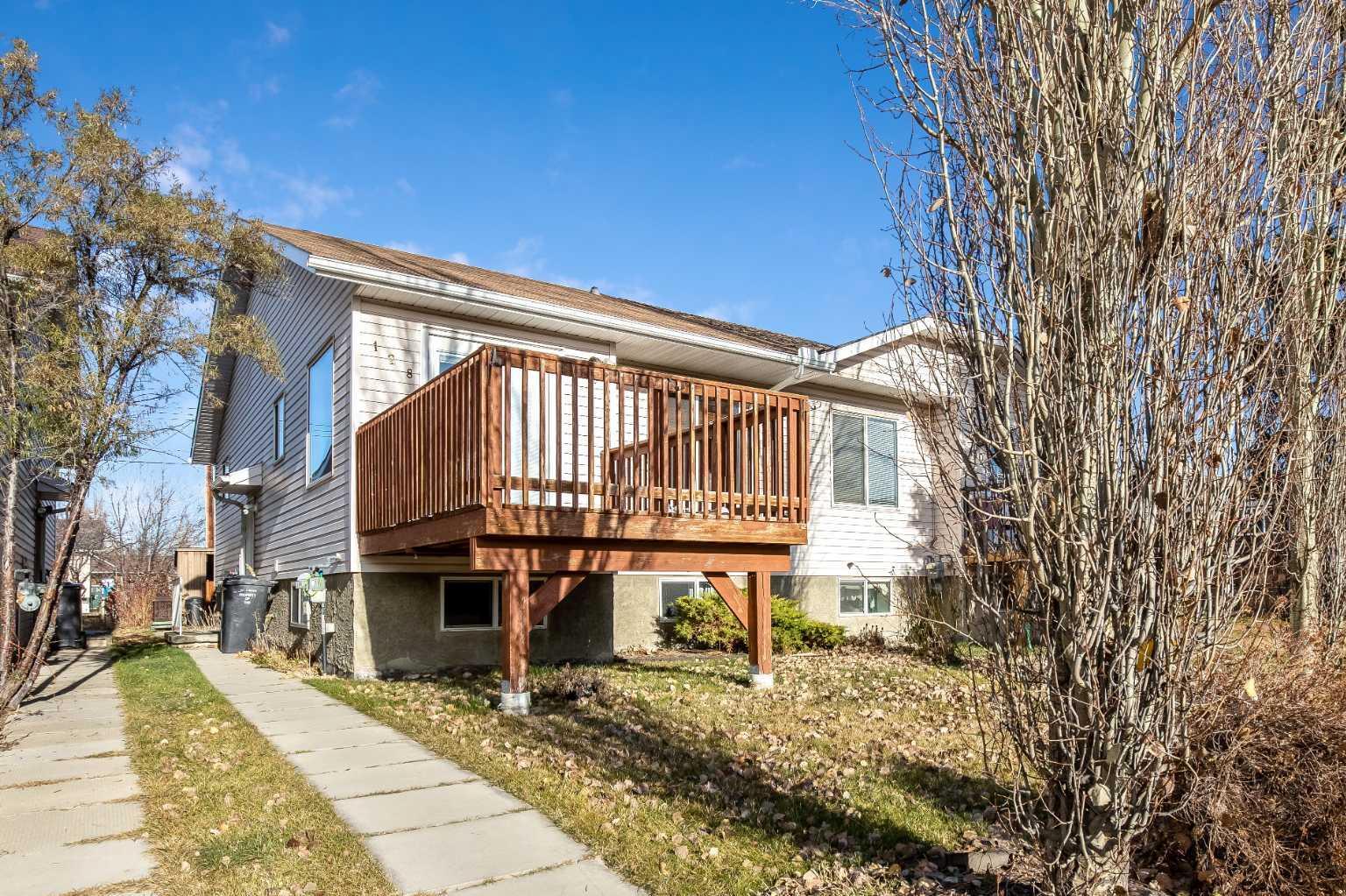 Property Photo: 128 8 Avenue SE AB T1V 1R8