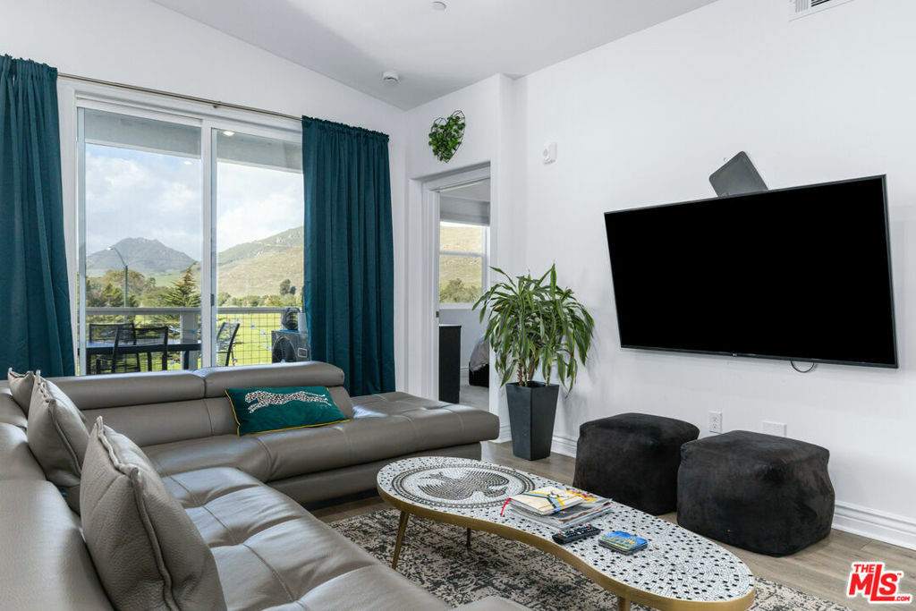 Property Photo:  915 Madonna Rd 302  CA 93405 