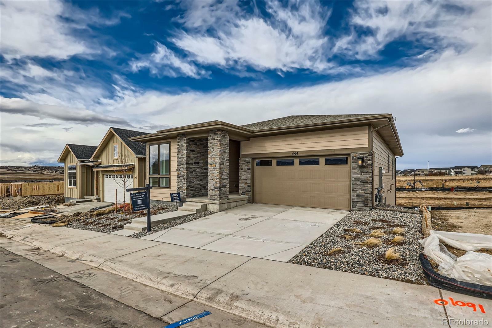 Property Photo: 454 Basin Daisy Street CO 80104