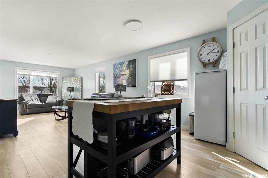 Property Photo: 3335 Quance Street E 100 SK S4V 3G4