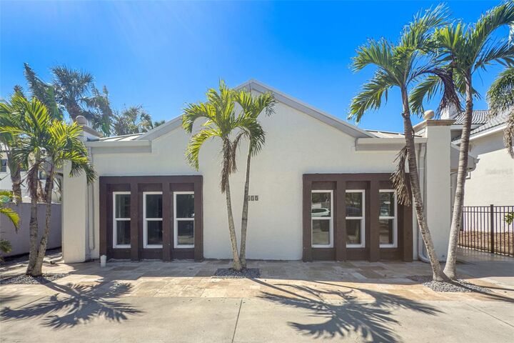 Property Photo:  115 N Blvd Of The Presidents  FL 34236