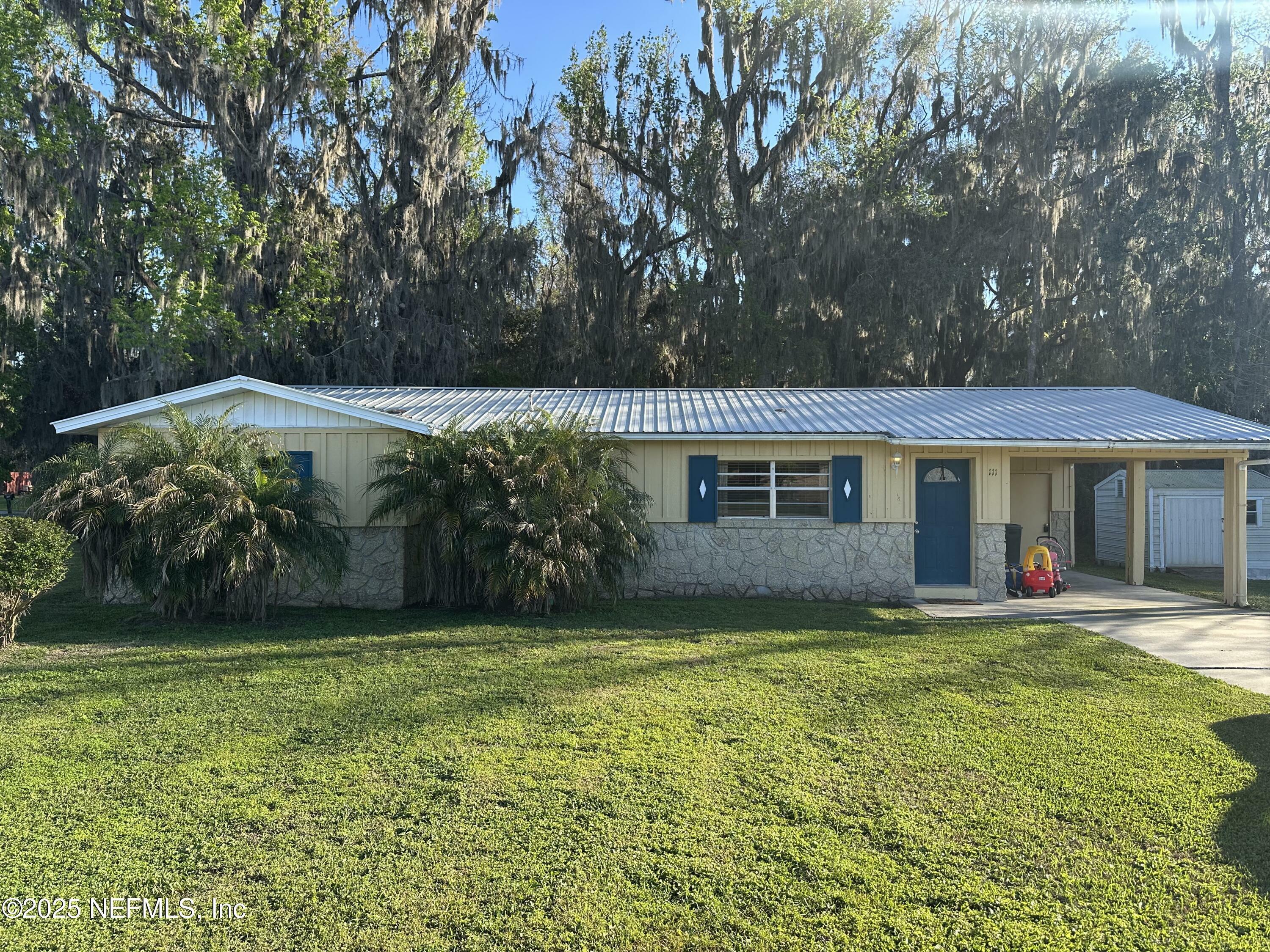 Property Photo:  111 Palm Trail  FL 32131 