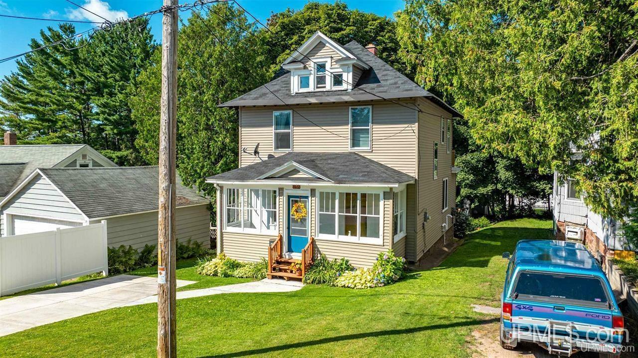 Property Photo:  1122 Summit Street  MI 49930 