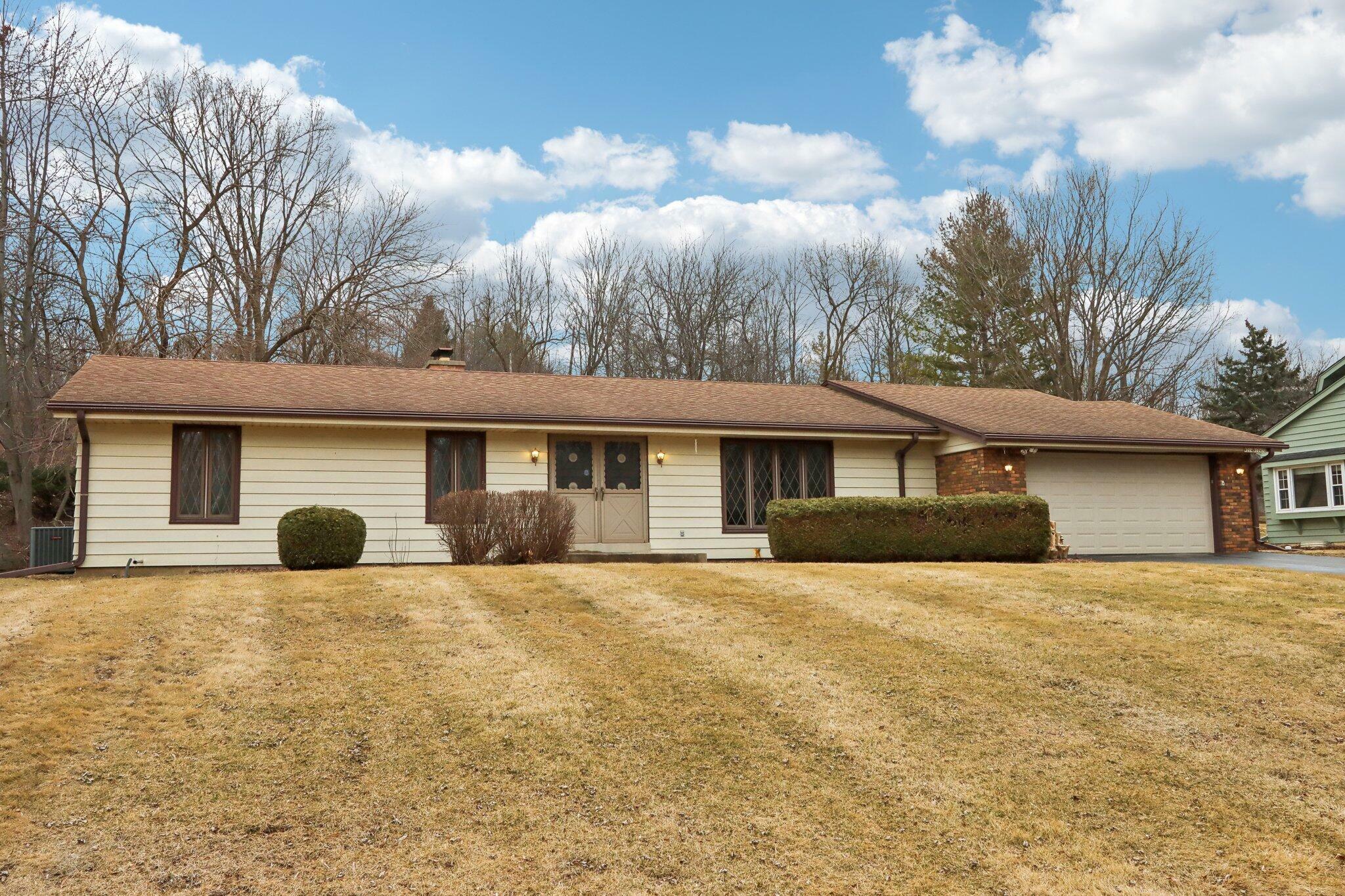 Property Photo:  W214n10470 Oak Ln  WI 53022 