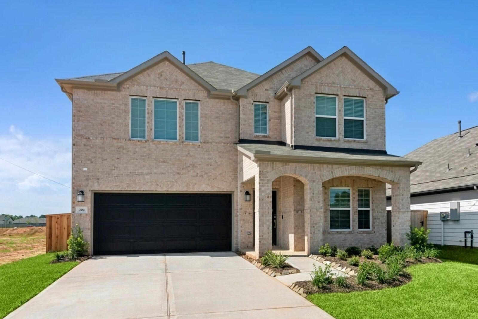Property Photo:  204 Wasatch Peaks Way  TX 77378