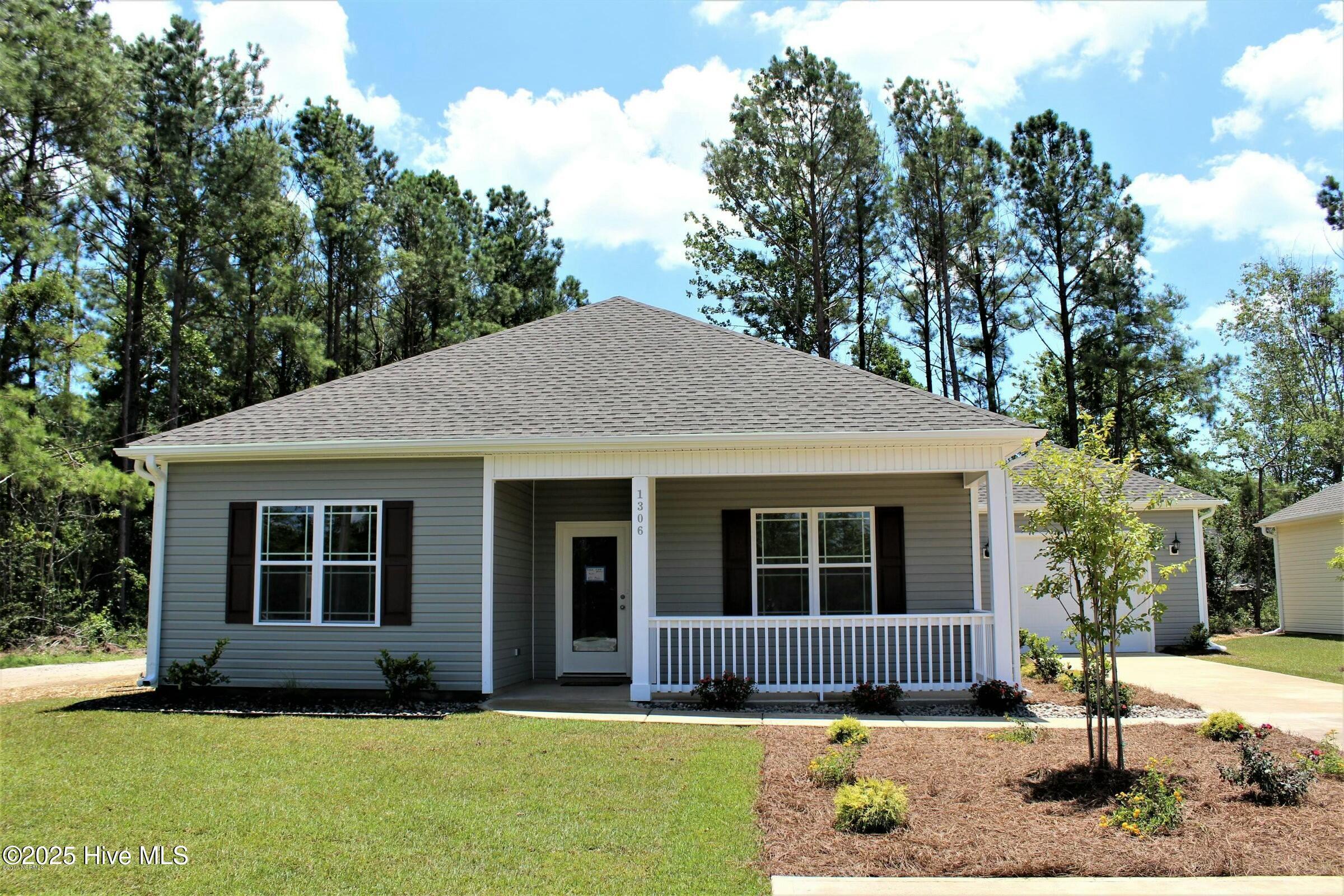 Property Photo:  1306 Old Folkstone Road  NC 28460 