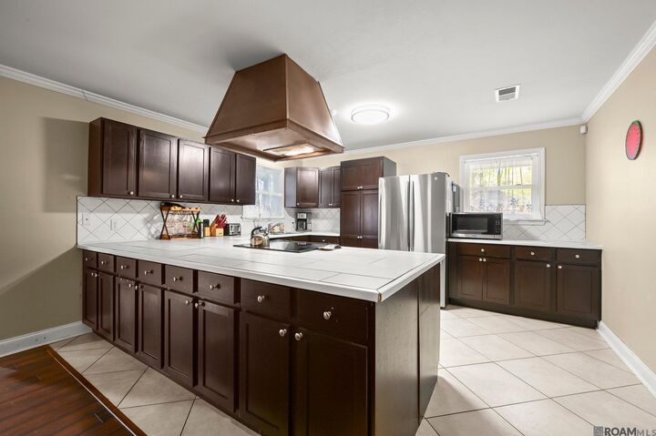 Property Photo:  13574 Reed Ave  LA 70818 