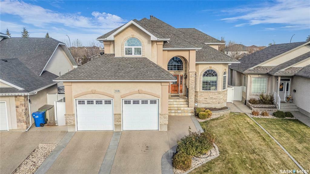 Property Photo: 1539 Lakeridge Drive N SK S4X 4L5
