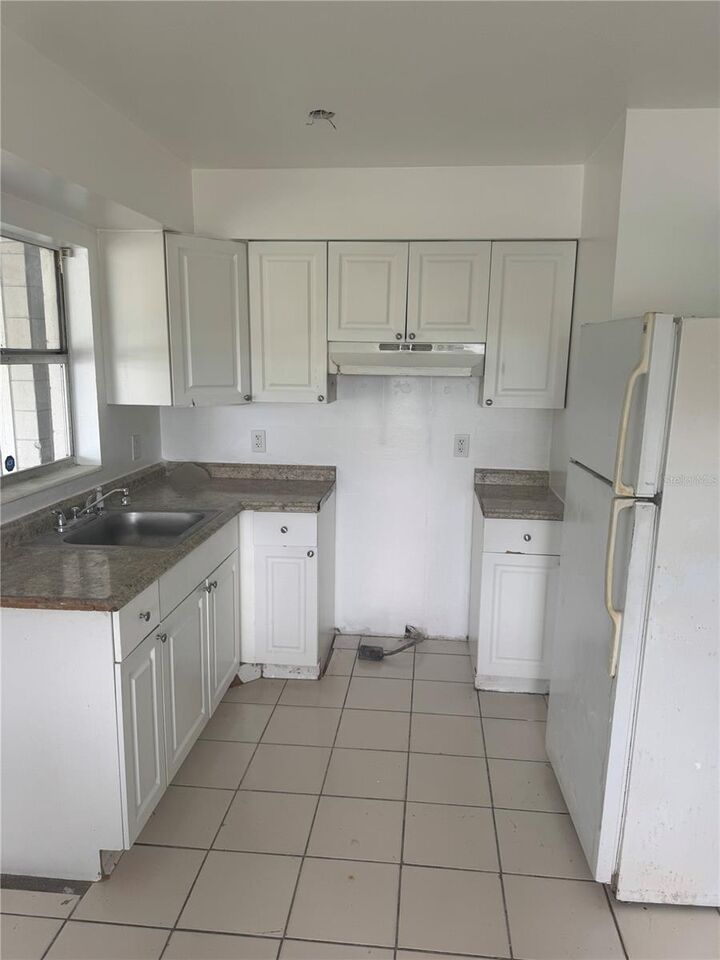 Property Photo:  4883 N Pine Hills Road  FL 32808 