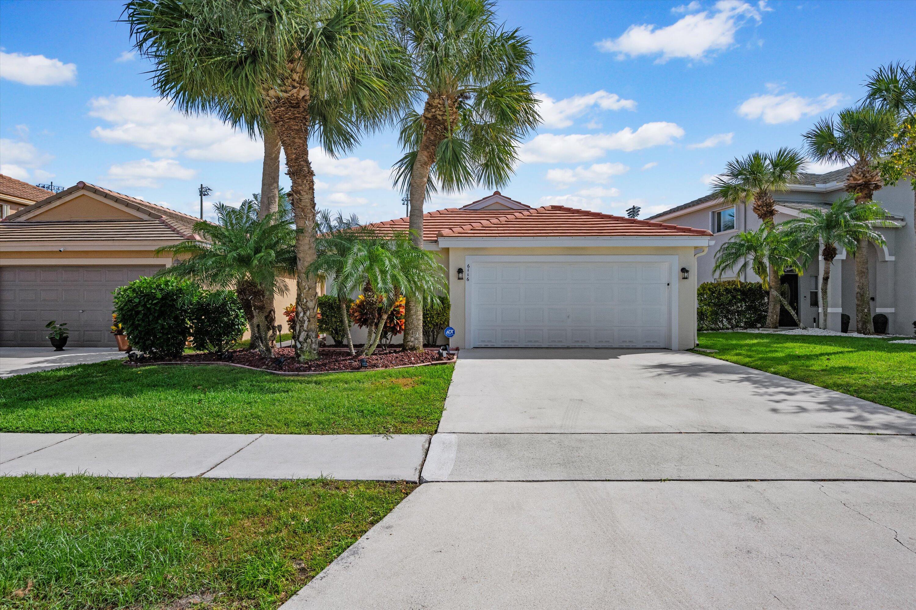 Property Photo:  6116 Spring Isles Boulevard  FL 33463 