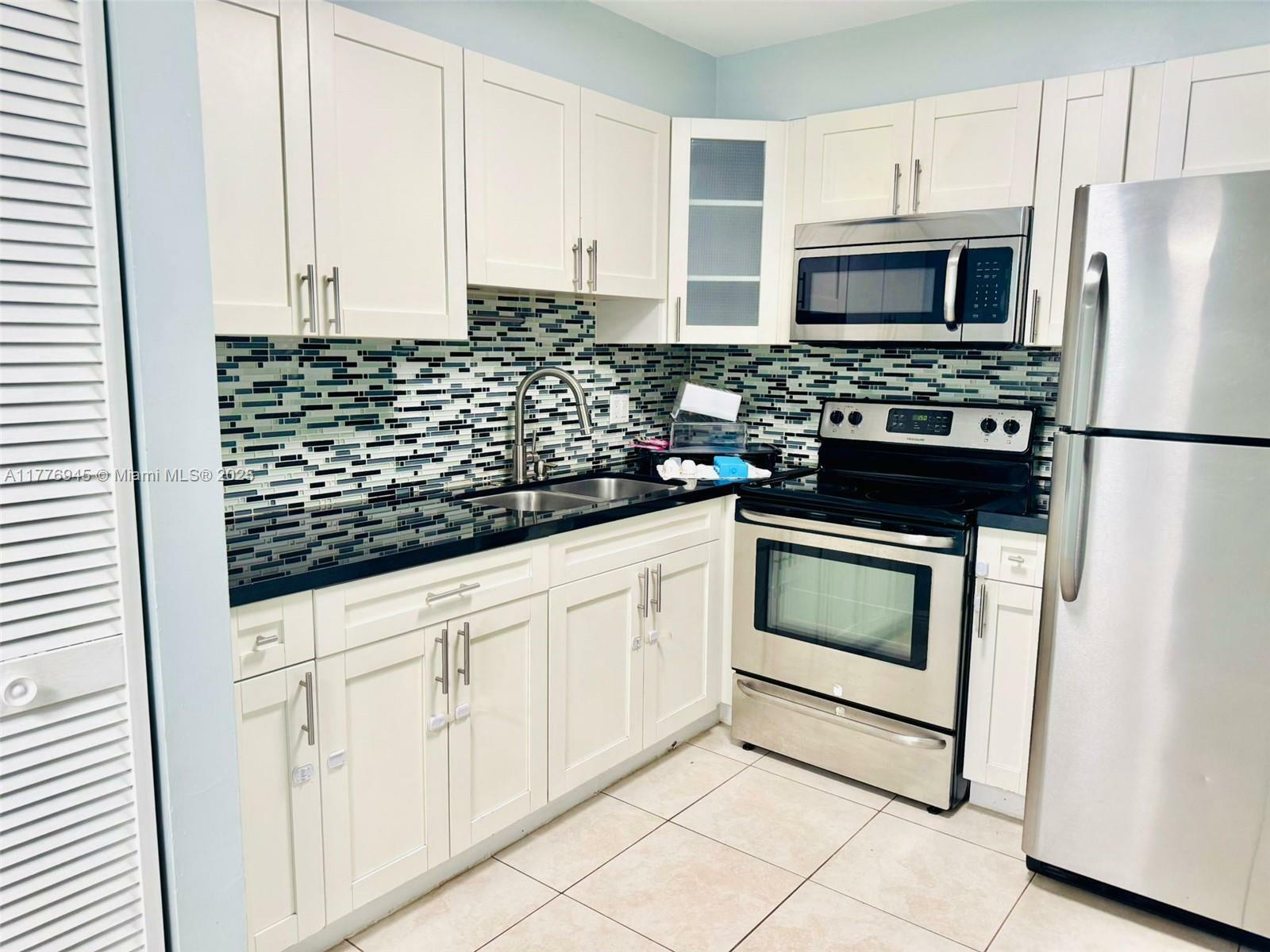 Property Photo:  2055 SW 122nd Ave 220  FL 33175 