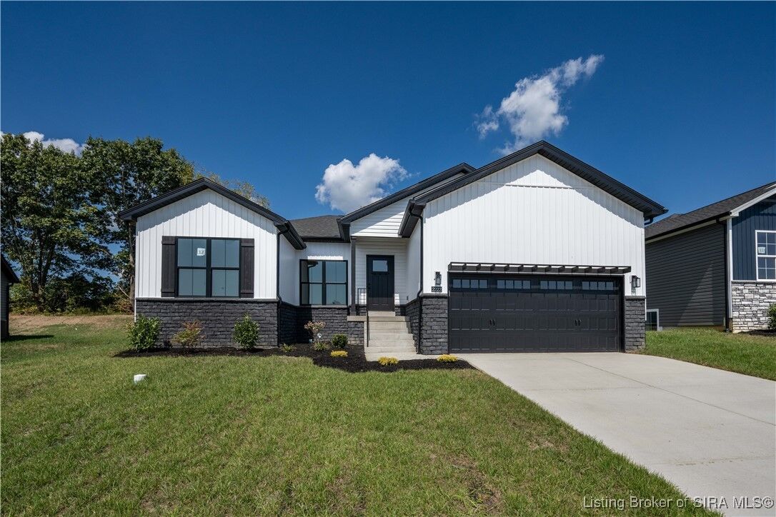 Property Photo:  2222 Pine Tree Lane Lot#112  IN 47143 