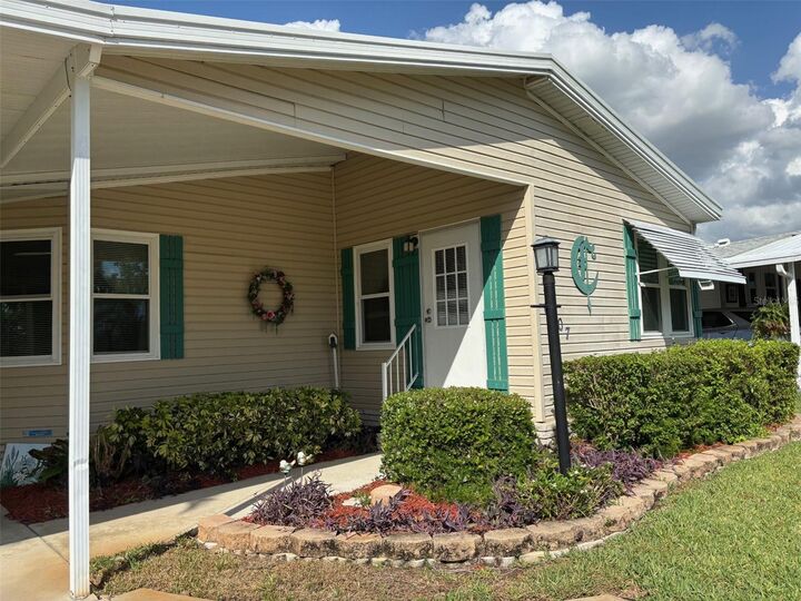 Property Photo:  6107 Grand Oaks Drive SE  FL 33884 