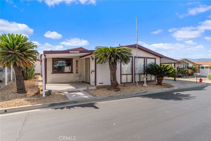 Property Photo:  13381 Magnolia Avenue 79  CA 92879 
