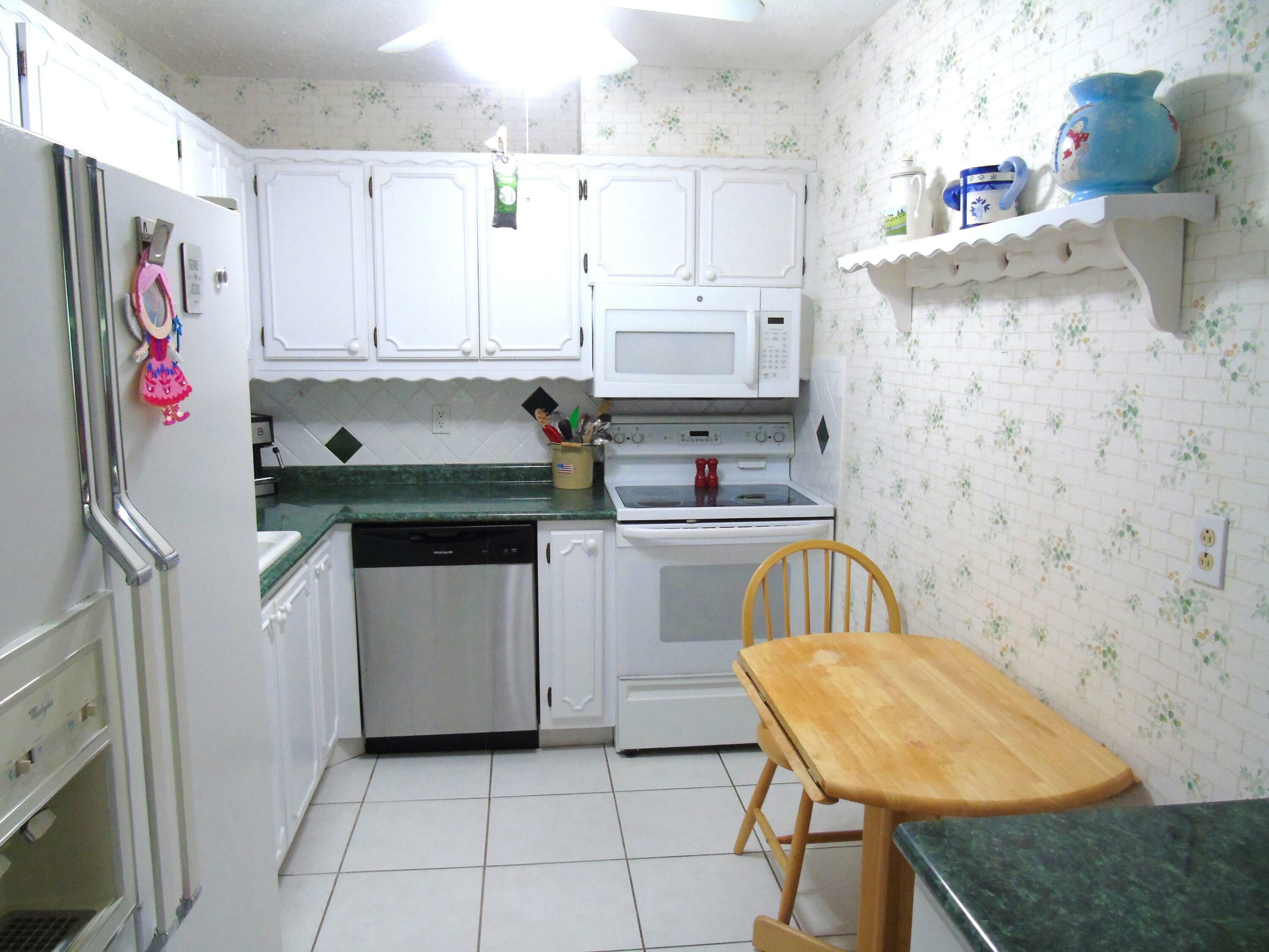 Property Photo: 10132 45th Way S 470 FL 33436