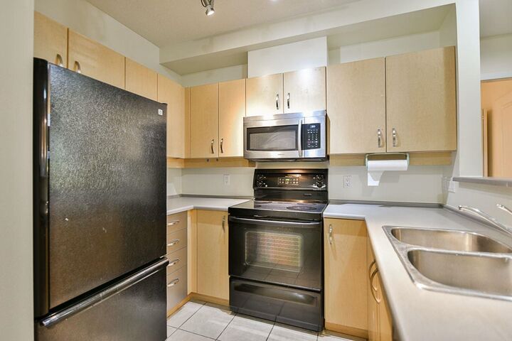 Property Photo:  10866 City Parkway 120  BC V3T 5W9 