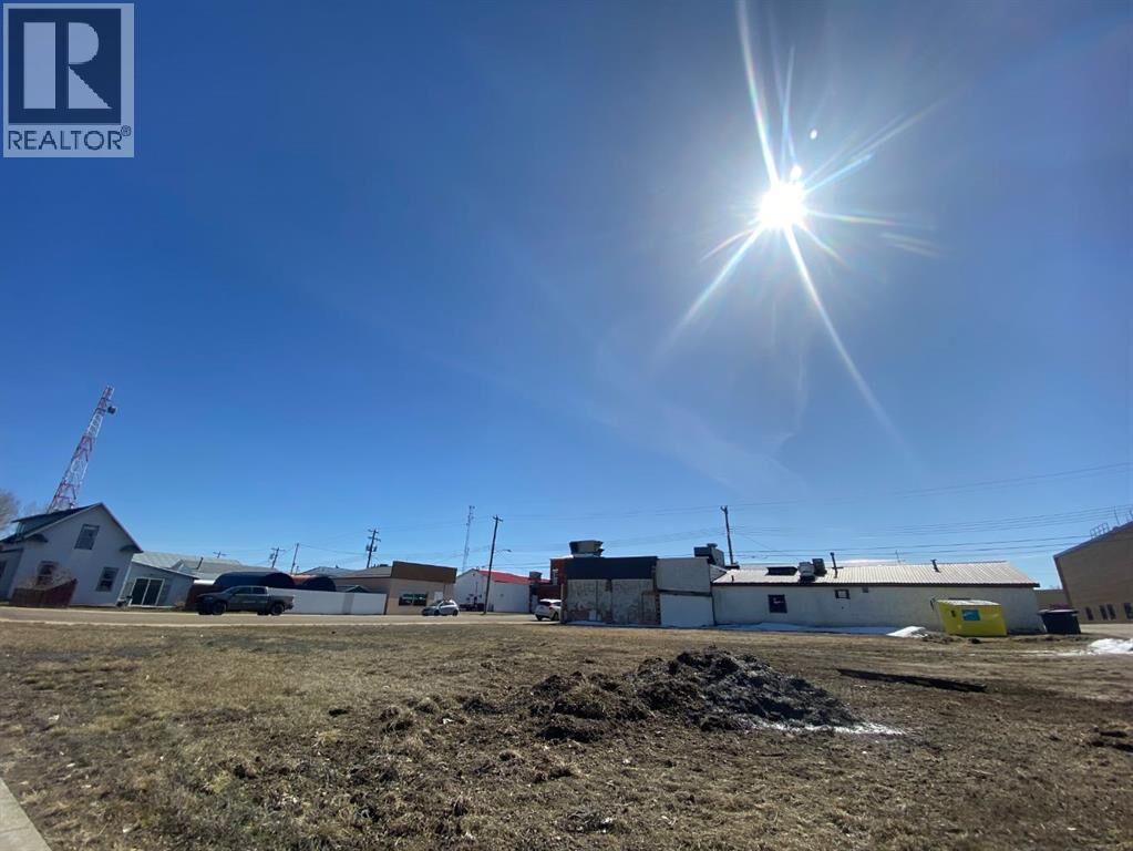 Property Photo:  305307 1 Street West  AB T0J 1P0 
