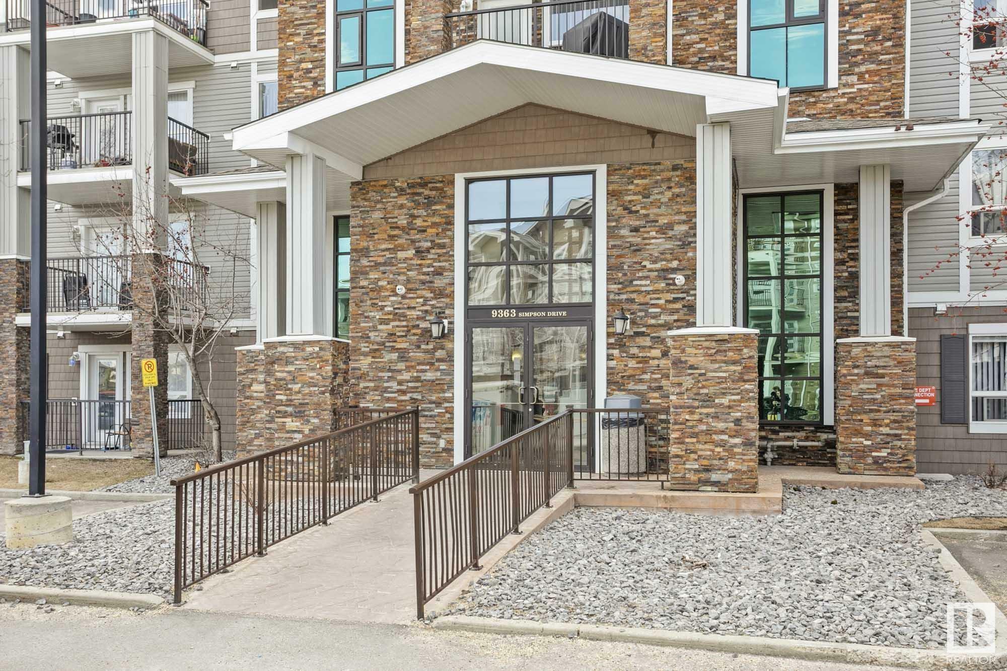 Property Photo: 9363 Simpson Drive NW 1123 AB T6R 0N2