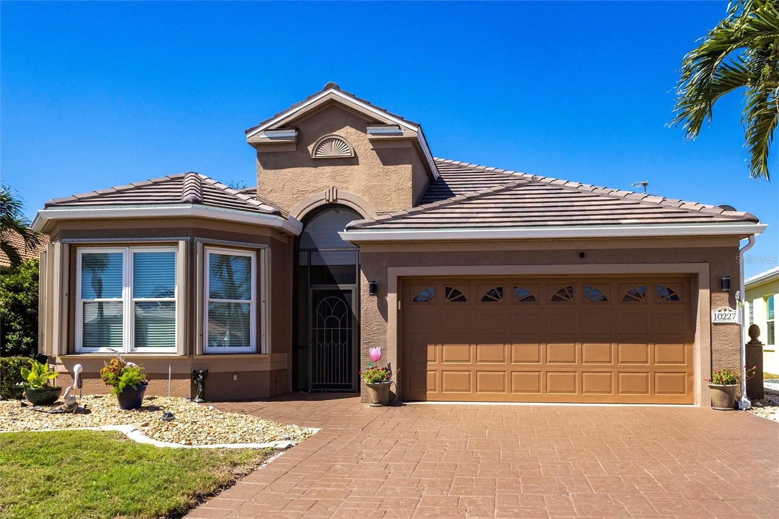 Property Photo: 10227 Windsong Road FL 33955