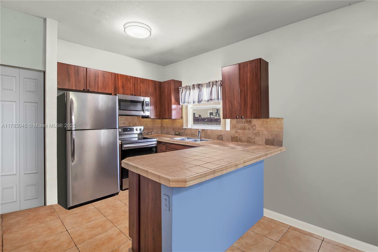 Property Photo: 14072 SW 51st Ln FL 33027