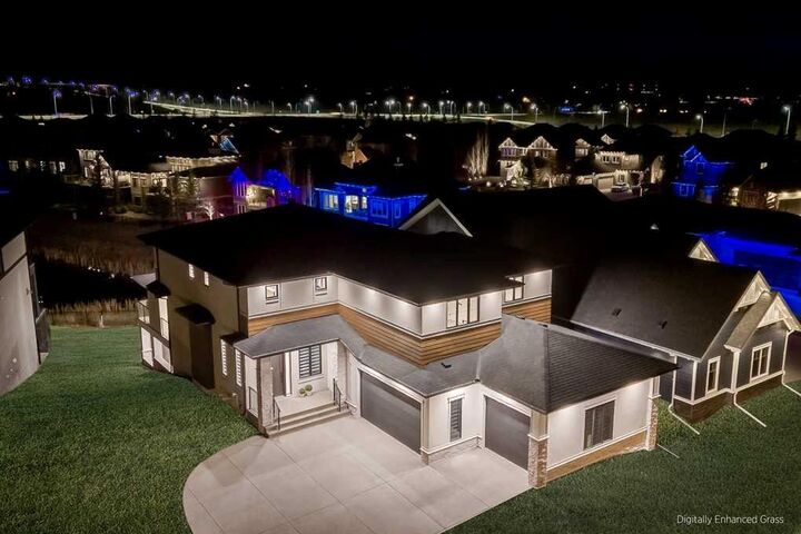 Property Photo: 10 Stillwater Bay AB T1S 4K5