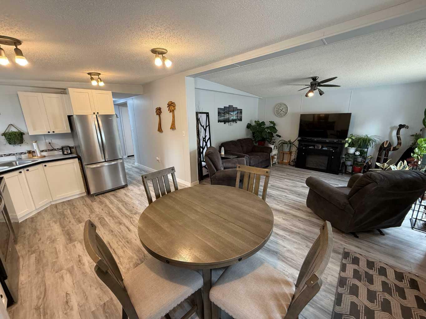 Property Photo: 700 Carmichael Lane 413 AB T7V 1S9