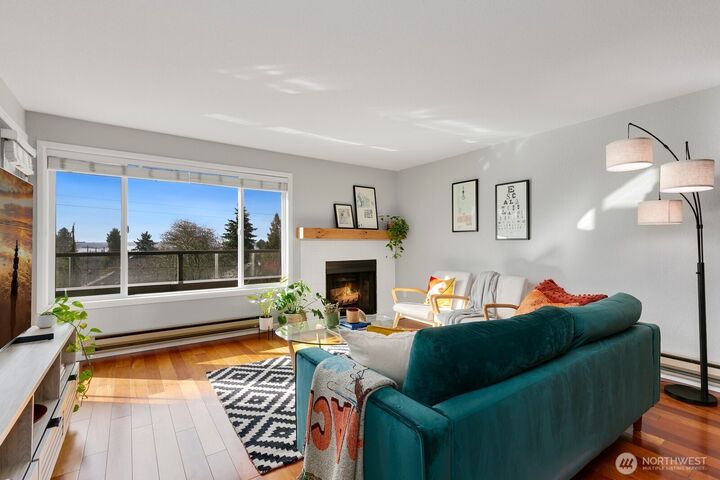 Property Photo:  6055  35th Avenue SW 202  WA 98126 