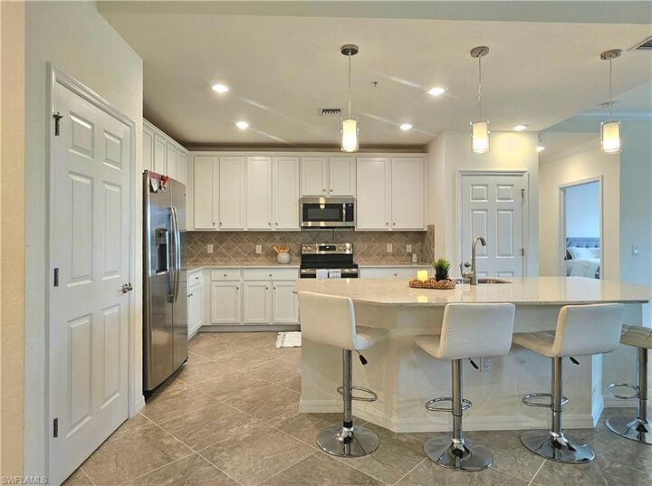 Property Photo:  11768 Grand Belvedere Way 103  FL 33913