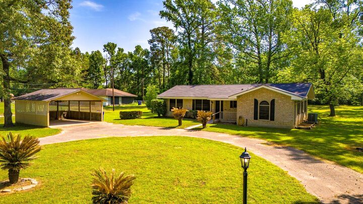 Property Photo:  209 H Armitage Road  TX 77351 