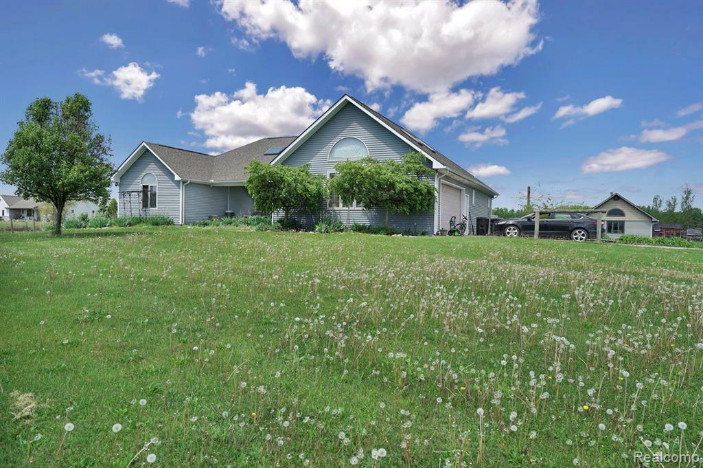 Property Photo:  8322 N Short Road  MI 48063 3219 