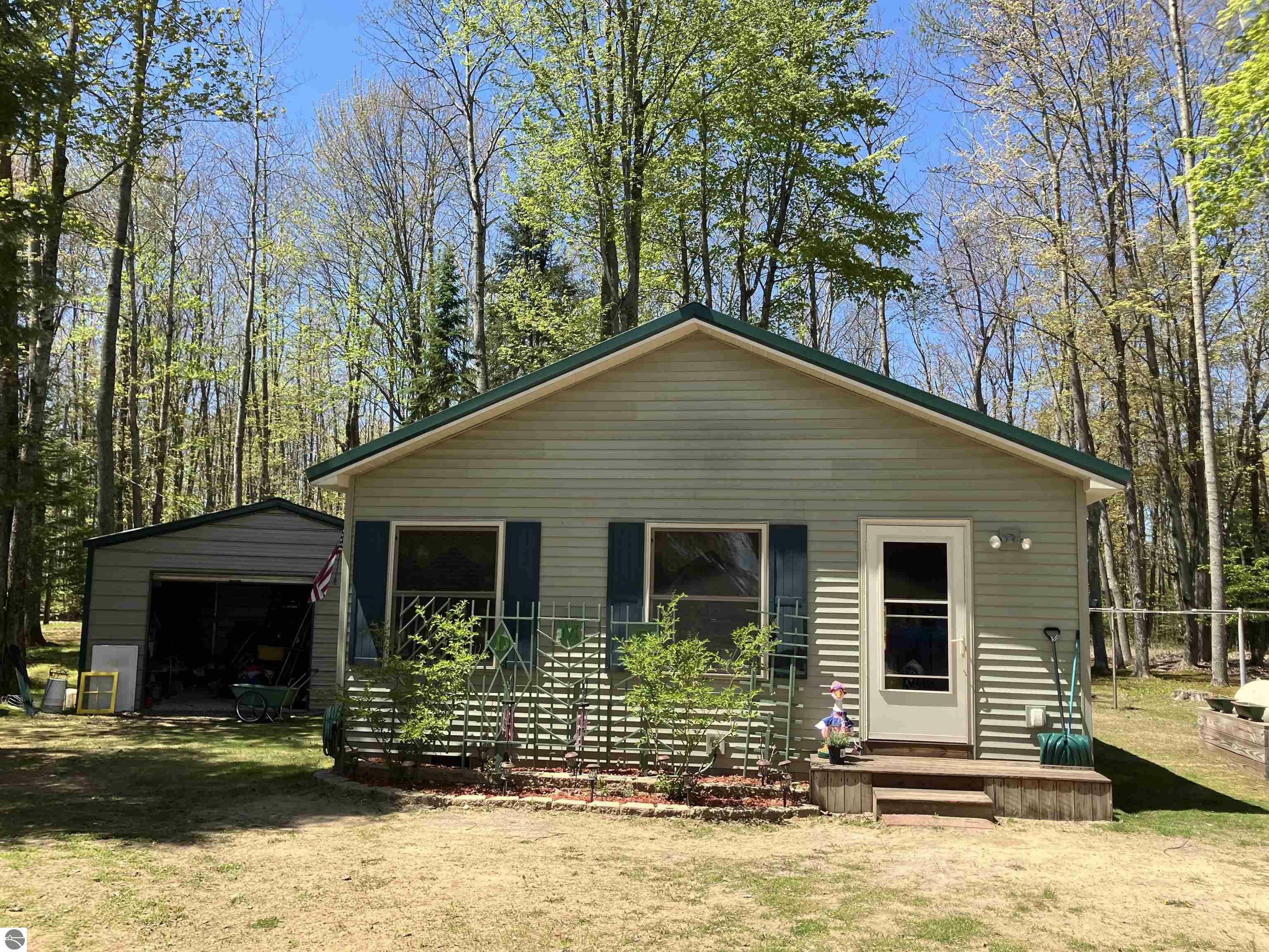 Property Photo:  1295 NE Wa-Ba-Tesse Drive  MI 49646 