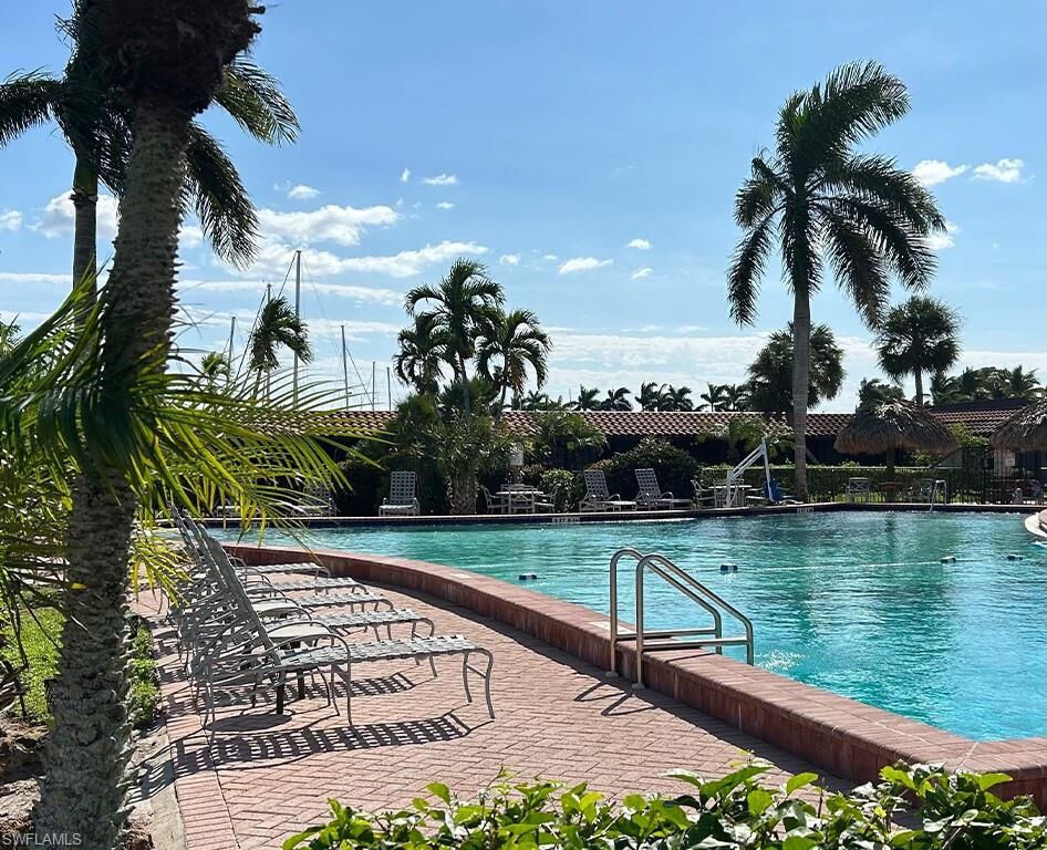 Property Photo:  25000 Tamiami Trl E F276  FL 34114 