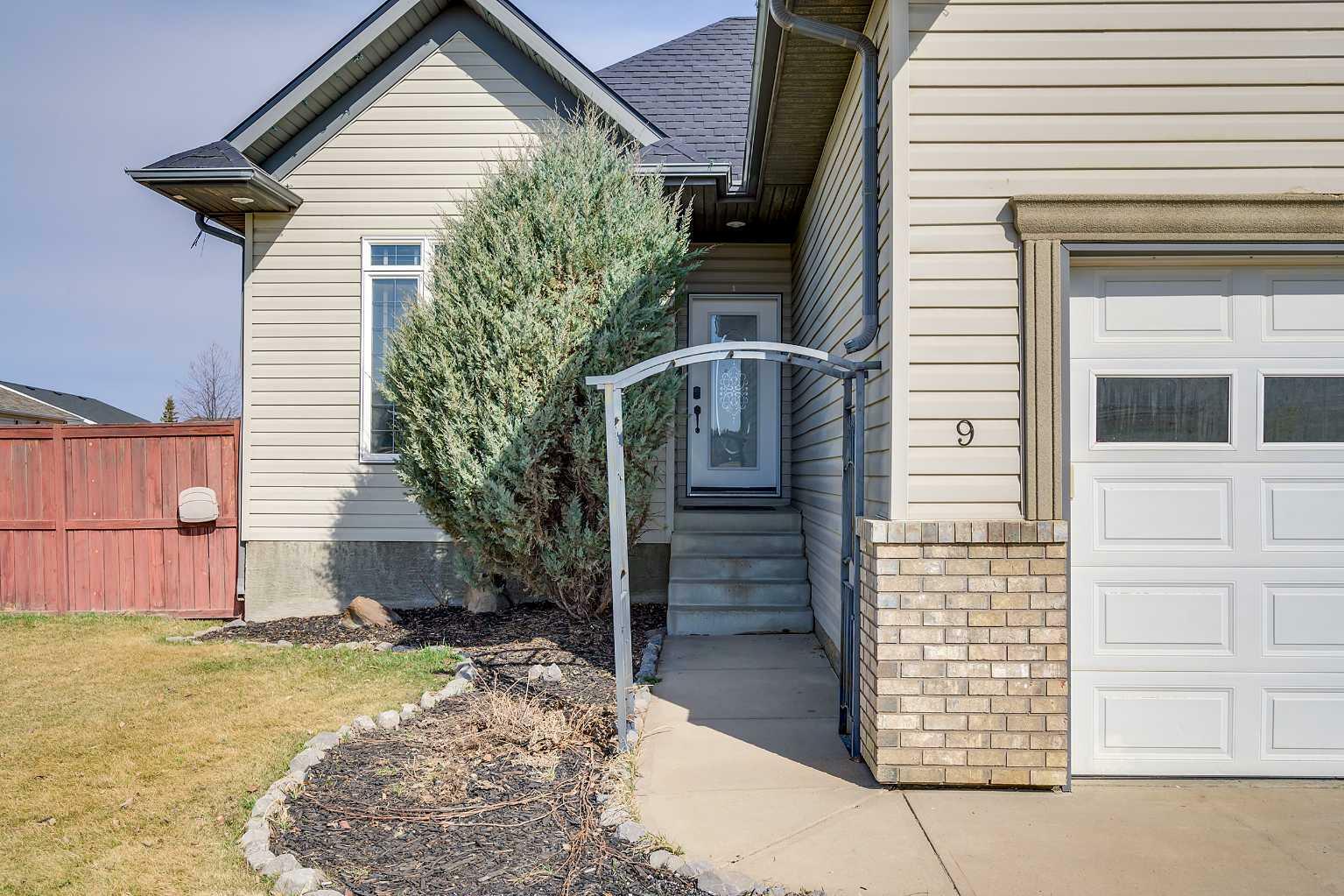Property Photo: 9 Falcon Ridge Drive AB T4S 1Z2