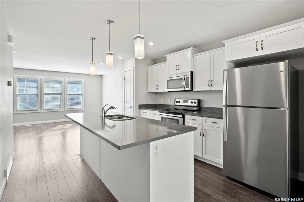 Property Photo: 1220 Pringle Way 217 SK S7T 0X5