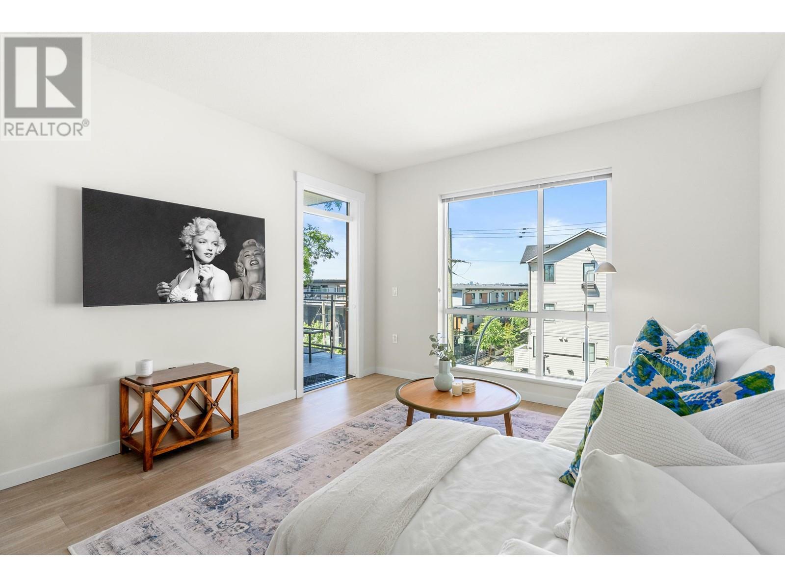 Property Photo: 615 East 3rd Street 205 BC V7L 0G3