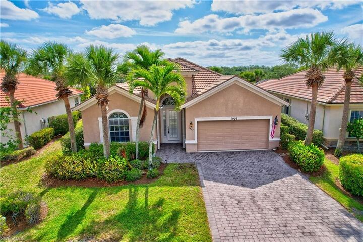 Property Photo: 7903 Founders Cir FL 34104