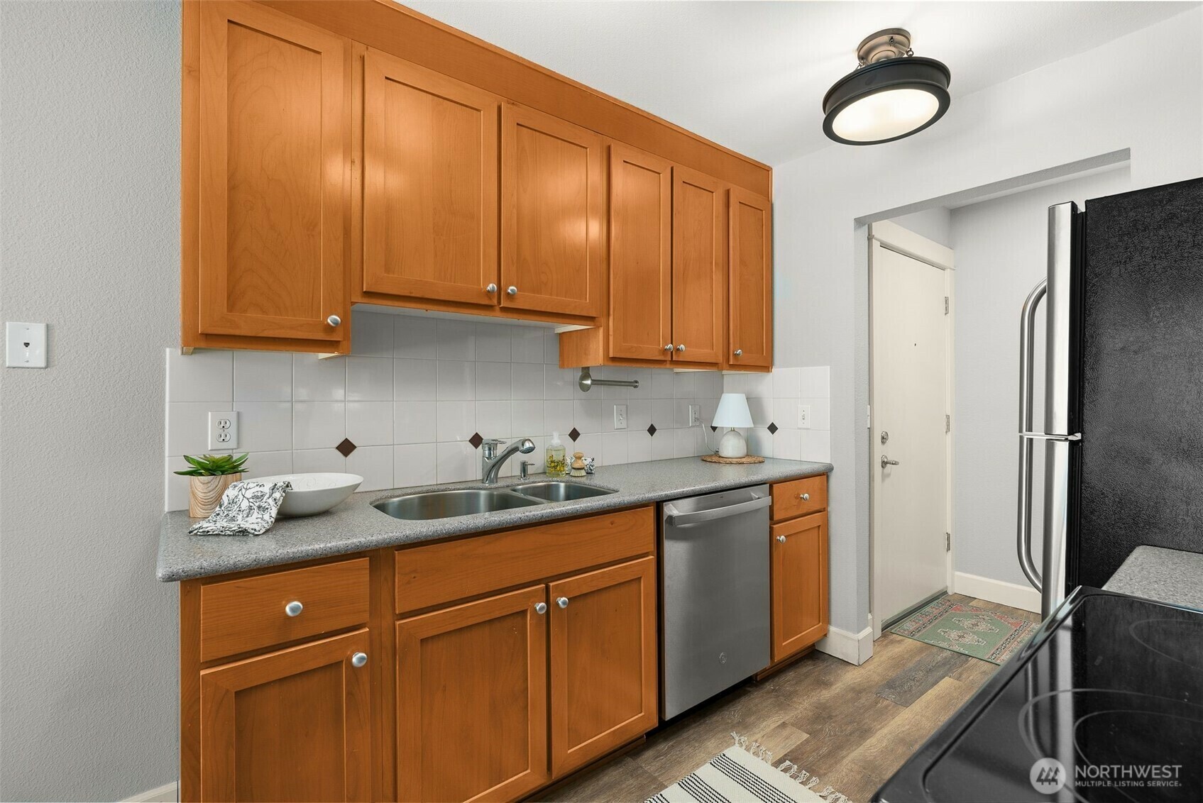 Property Photo: 8025 234th Street SW 116 WA 98026