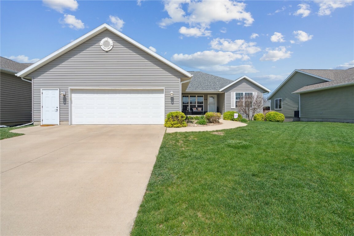 Property Photo: 218 Cherry Park Dr NW IA 52405