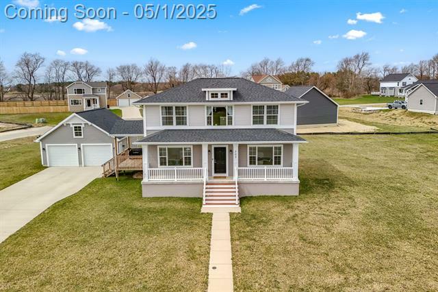 Property Photo: 703 Oakwood Drive MI 48813