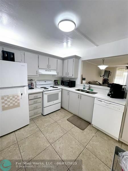 Property Photo:  406 NW 68th Ave 419  FL 33317 