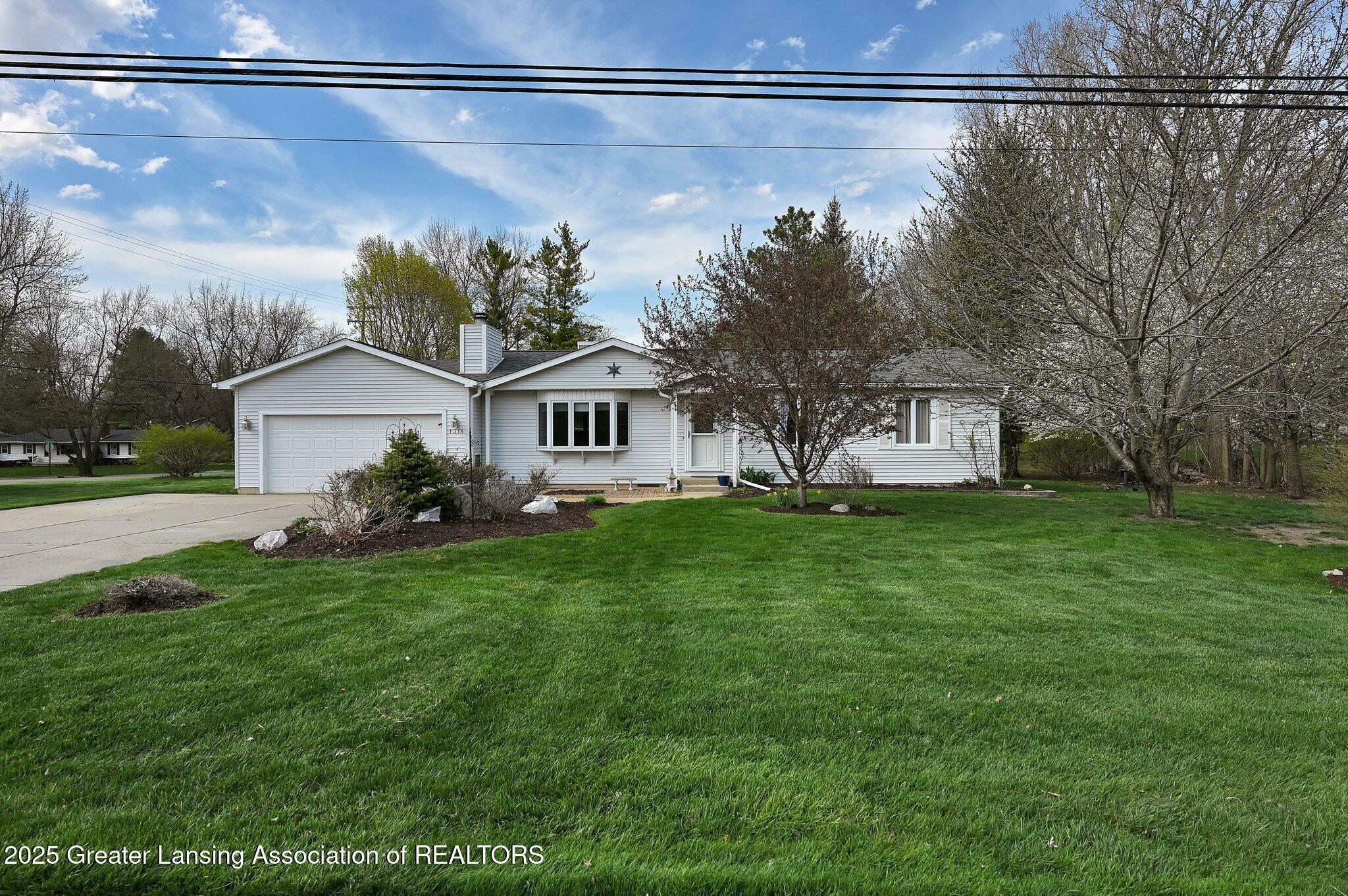 Property Photo: 1318 W Herbison Drive MI 48820