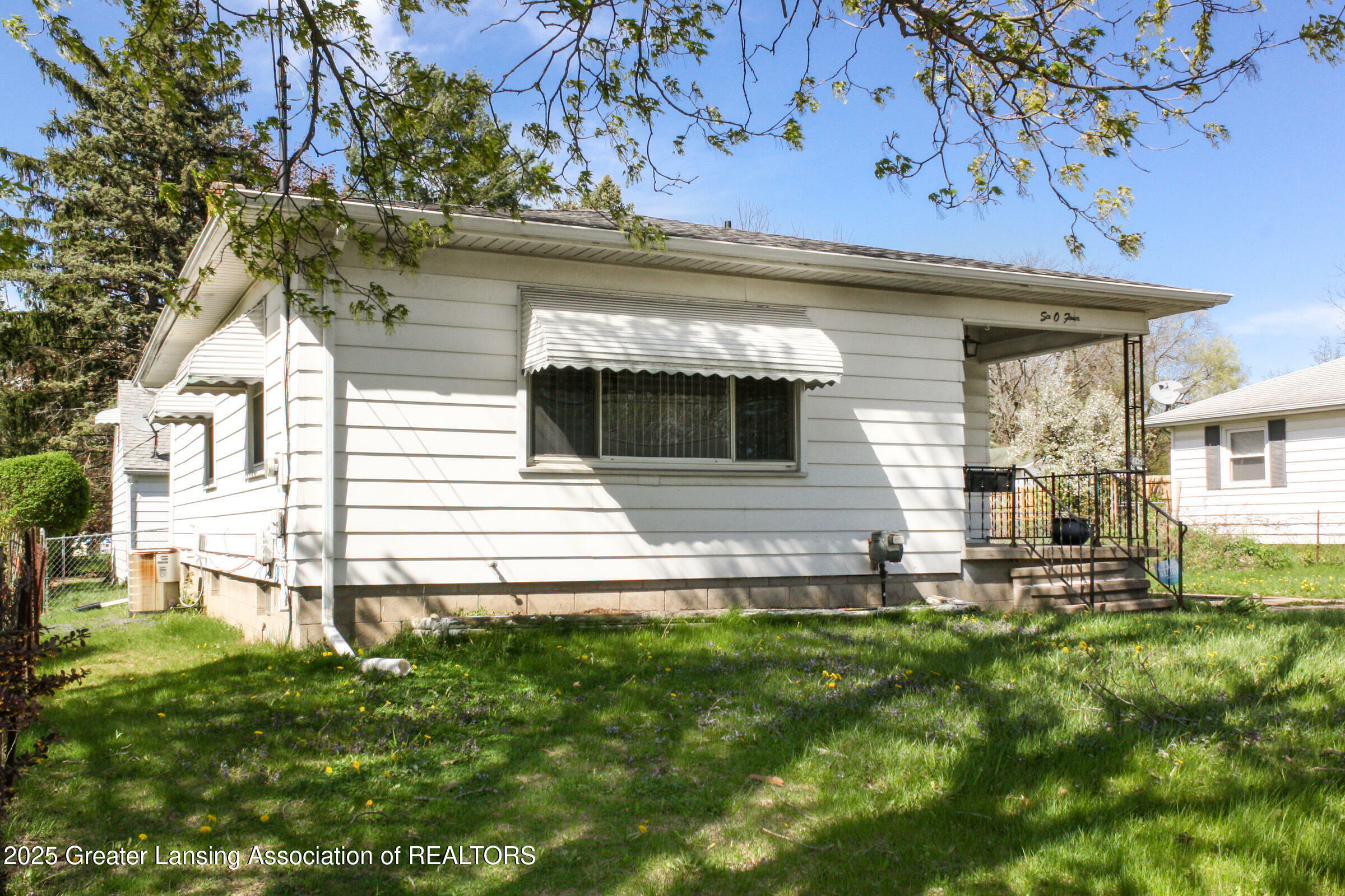 Property Photo: 604 W Holmes Road MI 48910