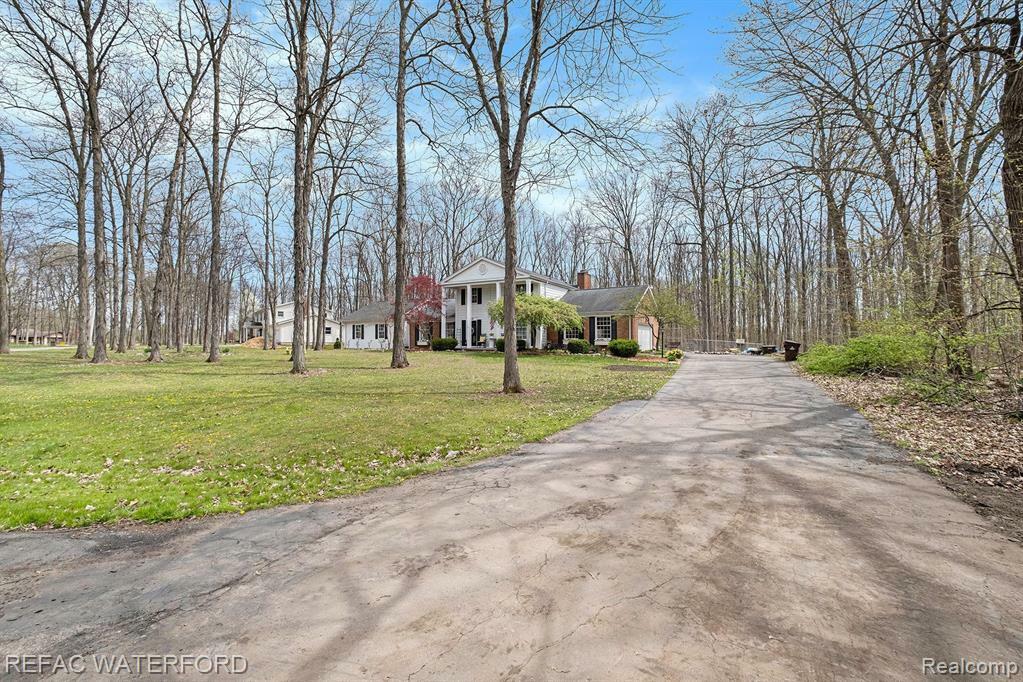 Property Photo: 1900 Maplewood Drive MI 48867 9082