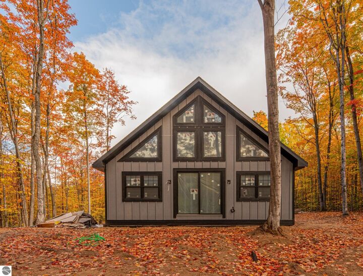 Property Photo:  4972 Hawks Spur  MI 49615
