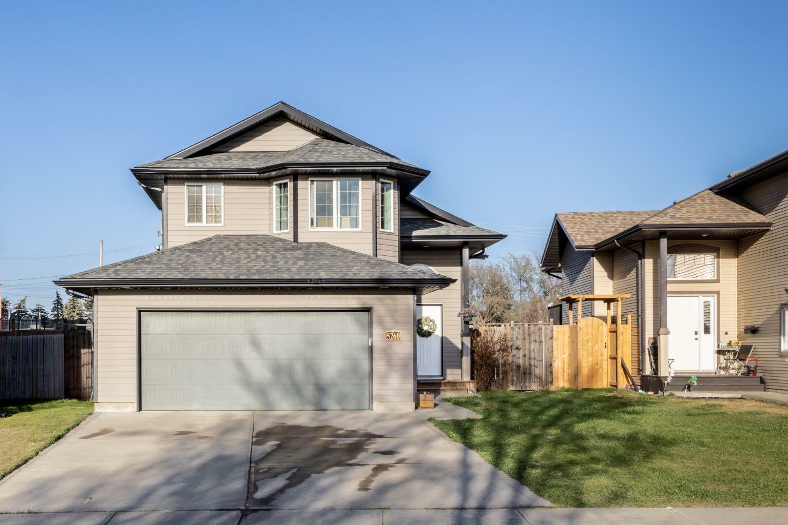 Property Photo: 5260 48 Street Close AB T4G 0B9