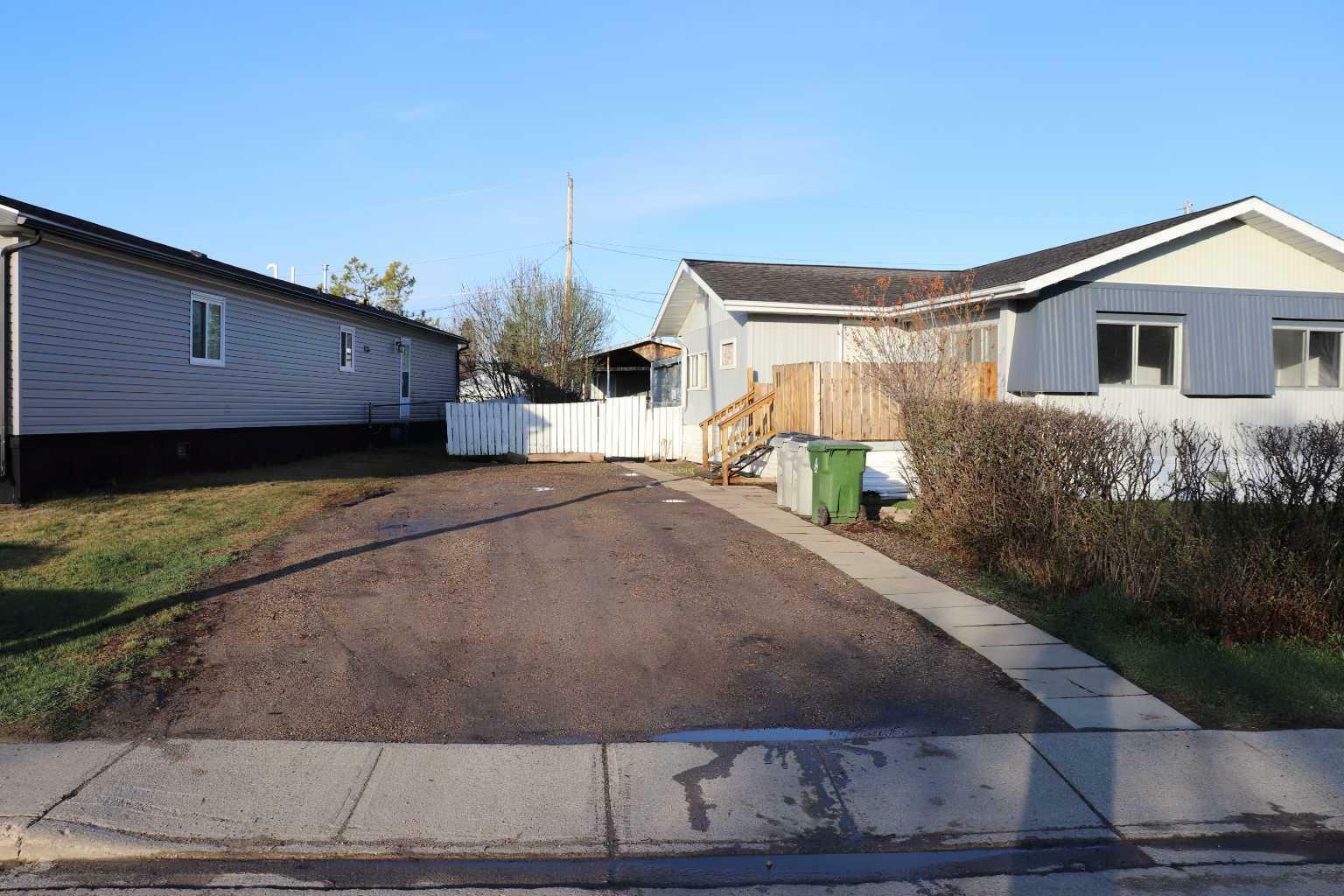 Property Photo: 718 52 Street AB T7E 1K5
