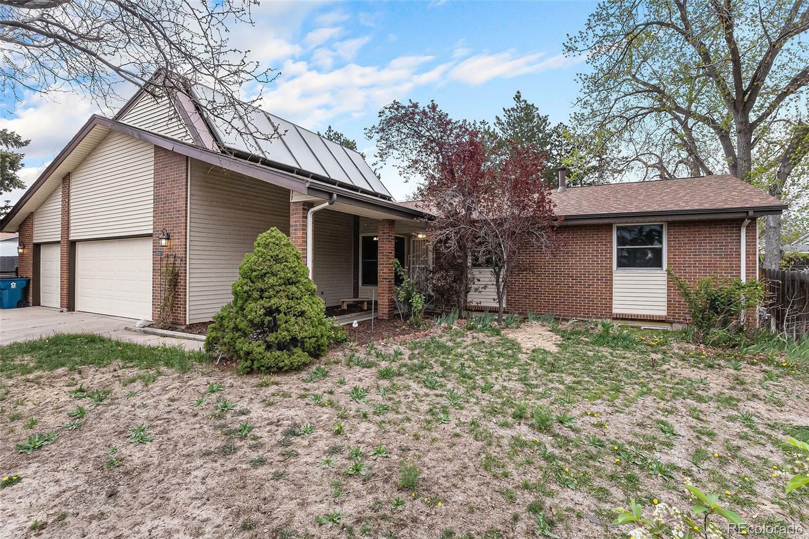Property Photo: 3312 S Ouray Way CO 80013