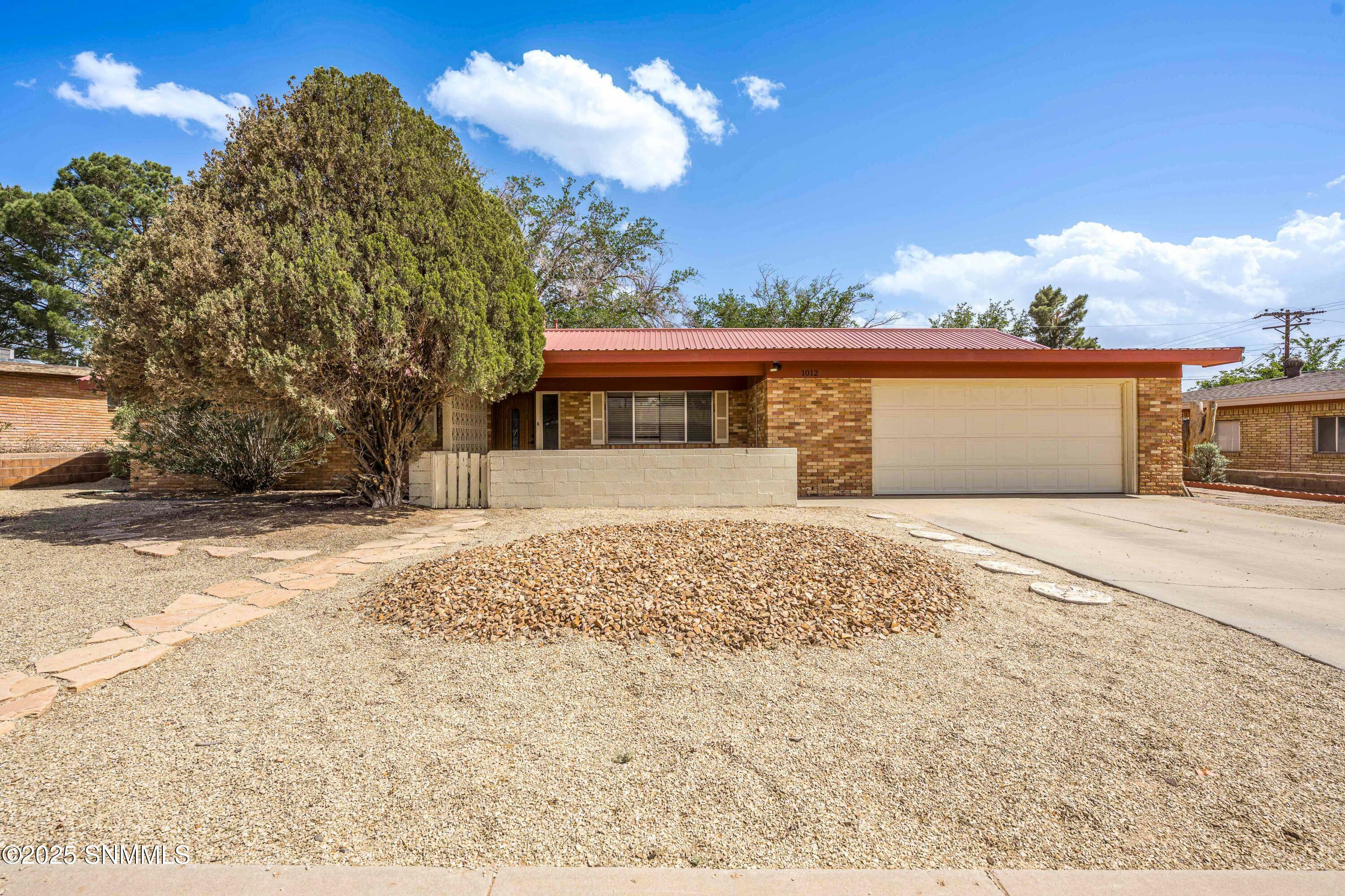 Property Photo:  1012 Cedardale Drive  NM 88005 